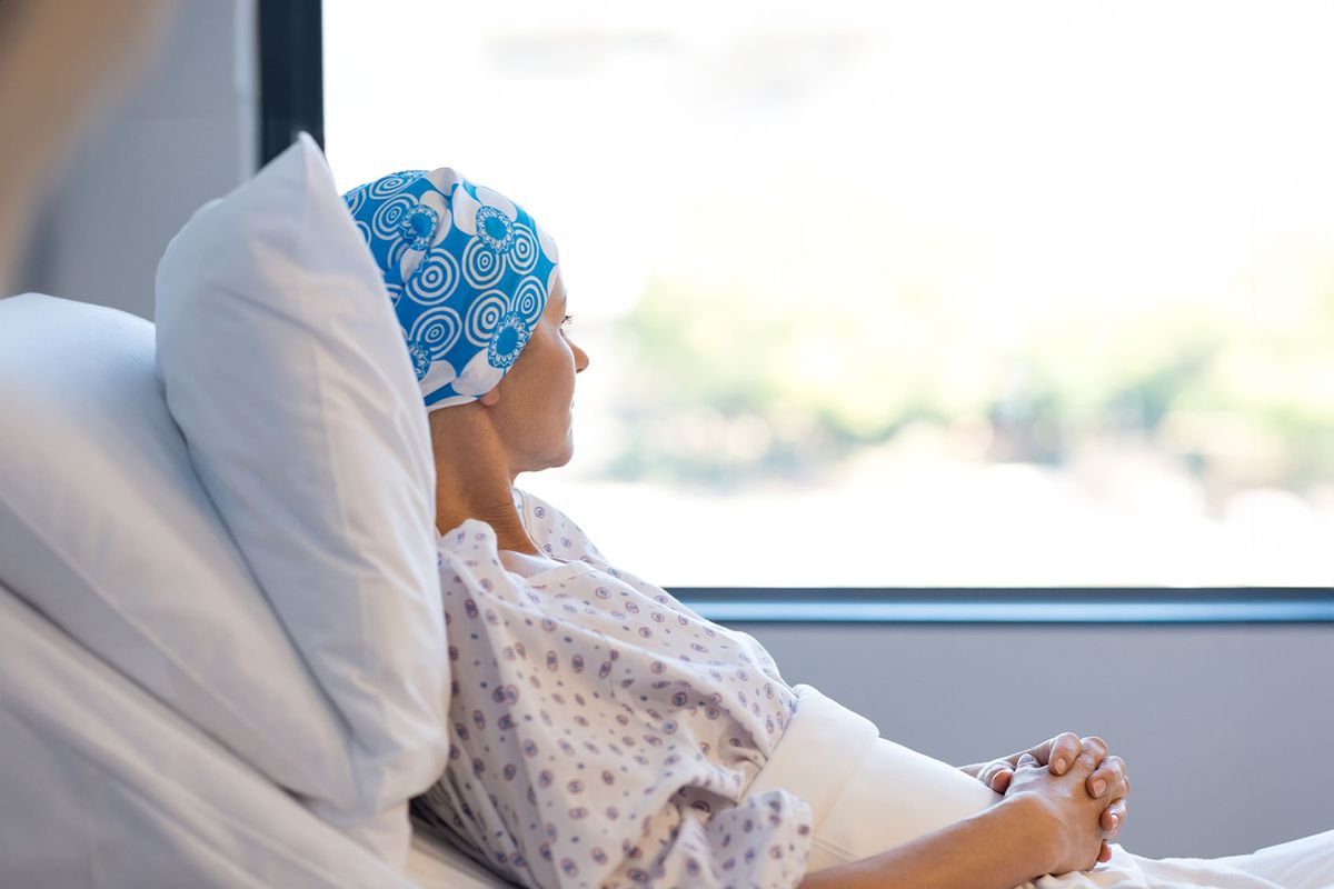 Young cancer patient resting in a hospital on bed. (Getty Images/Ridofranz)