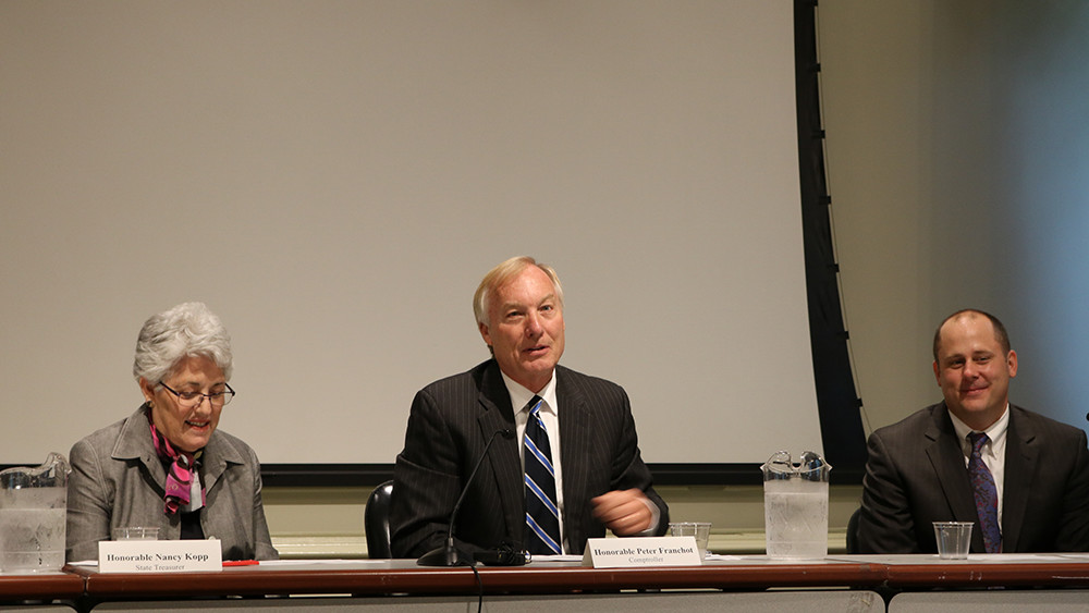 State Comptroller Peter Franchot, D, center, at the Board of Revenue Estimates meeting in Annapolis on Wednesday, September 21, 2016. Andrew Schaufele, director of the board, is to Franchot’s left. State Treasurer Nancy Kopp is on Franchot’s right. (Capital News Service photo by Vickie Connor)