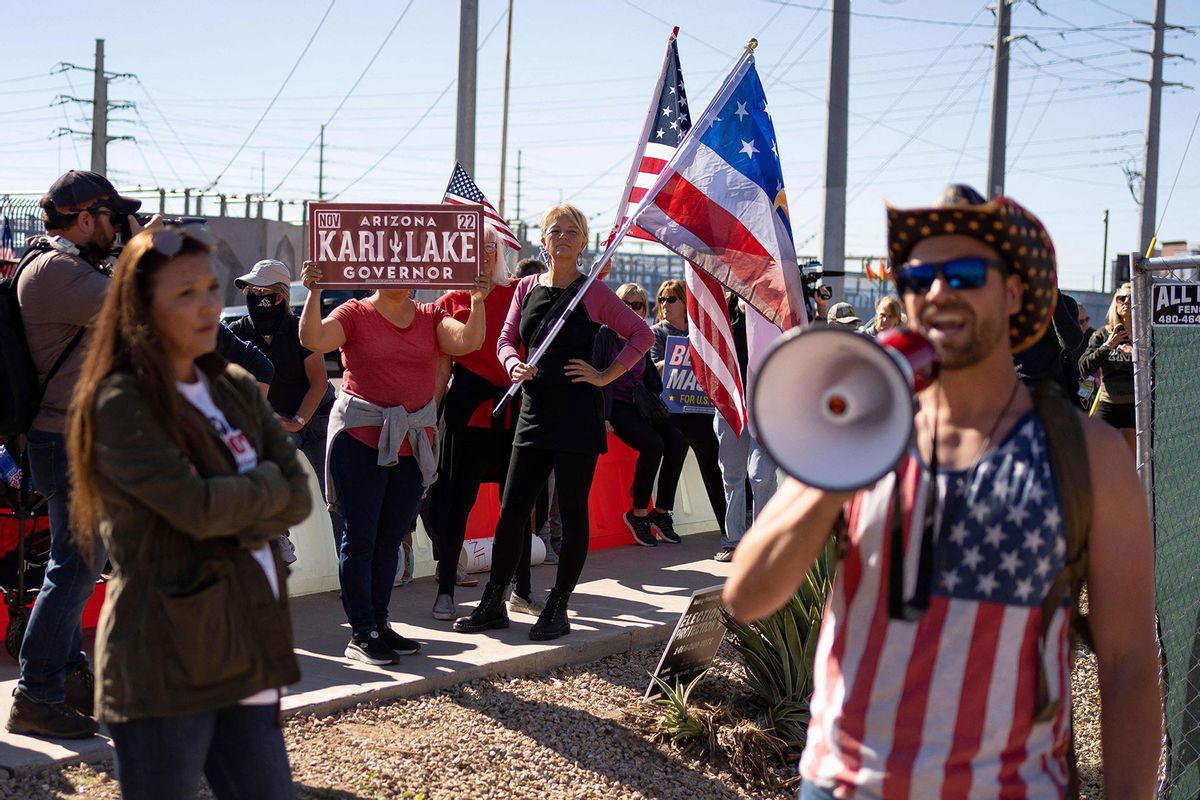 Demonstrators gather at a rally to protest midterm election results outside of Maricopa County Tabulation and Election Center in Phoenix, Arizona, on November 12, 2022. (REBECCA NOBLE/AFP via Getty Images)