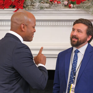 Gov. Wes Moore (left) chats with Secretary of Natural Resources Josh Kurtz after Board of Public Works meeting, Wednesday Nov. 29, 2023. (Capital News Service/Tommy Tucker)