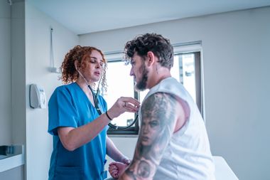 Transgender male patient being examined in hospital